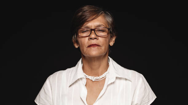 istock Senior woman with eyes closed 1152895067