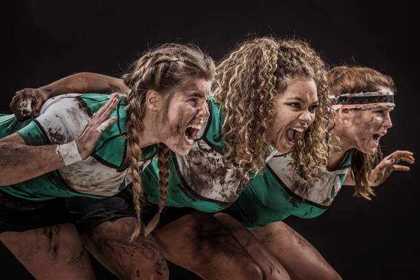 istock Three Dirty Female Rugby Players 1152896404