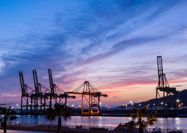 Cranes at sunset in the port of Barcelona