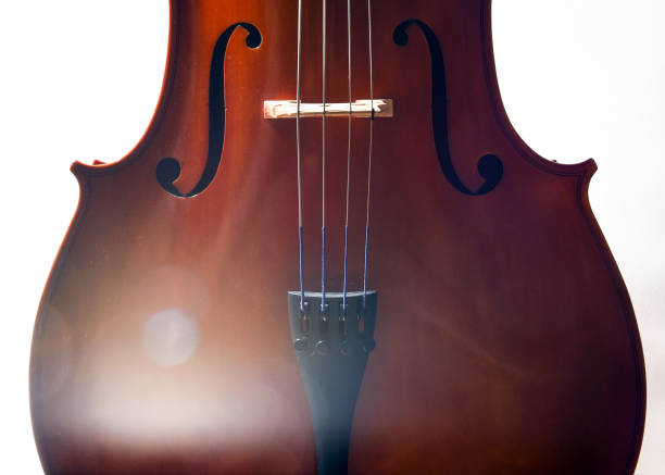 istock Cello in dramatic light with lens flare 1152902748