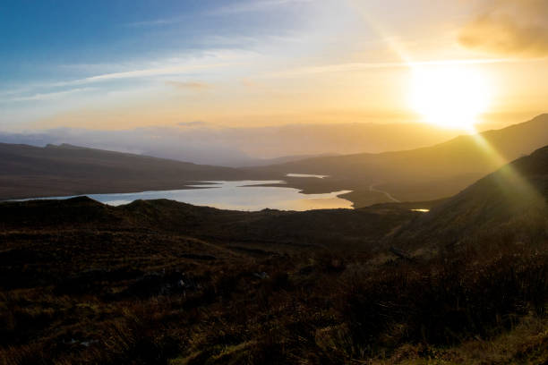 istock Contrast mountain landscape over highlands. Bright sblue sky over loch 1152902814