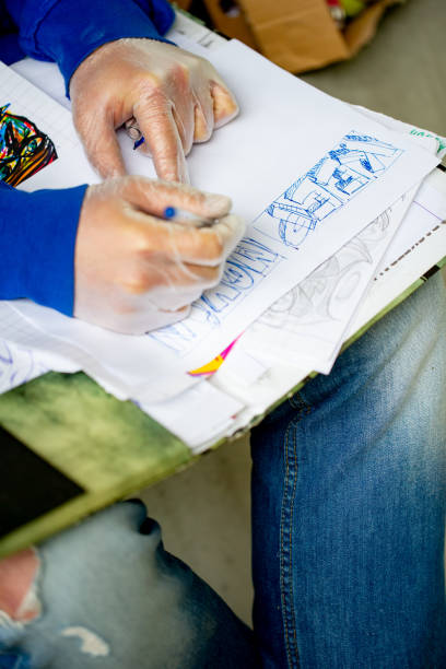 istock Graffiti Artist Drawing a Sketch 1152902834