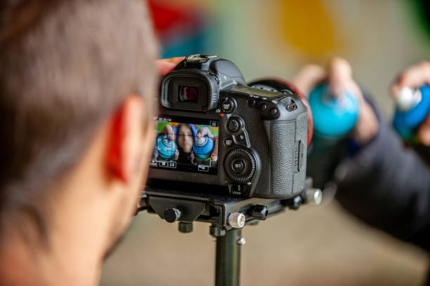 istock Videographer Filming Graffiti Artist 1152902891