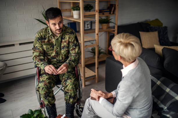 istock Depressed soldier and his psychotherapist during a session 1152903449