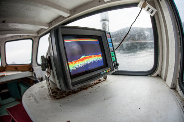 a sonar mounted in a wooden fishing boat, showing the sea bed. - naval ship imagens e fotografias de stock