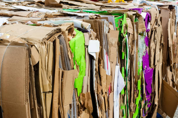 istock Angled edge view of cardboard box bundles ready for recycling 1152910688