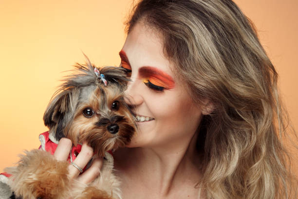 Woman hugging her dog