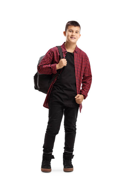 istock Trendy teenage boy with a backpack smiling at the camera 1152918375