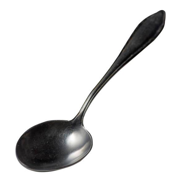 istock spoon isolated on white background. metal spoon. vintage spoon. 1152919949