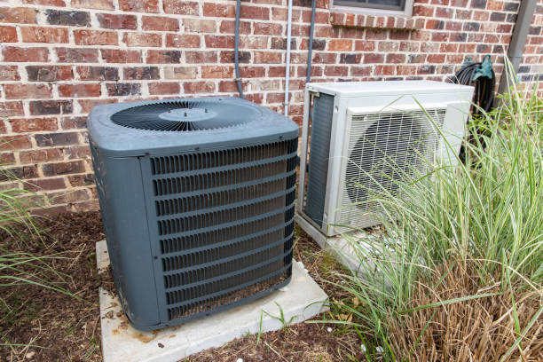istock Regular home HVAC air conditioner system and mini-split next to each other. 1152925460
