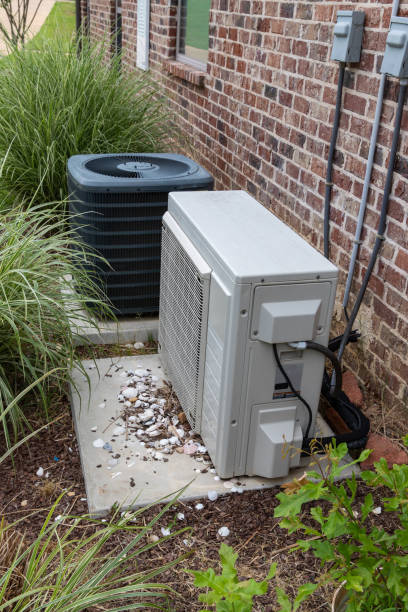 istock Regular home HVAC air conditioner system and mini-split next to each other. 1152925462