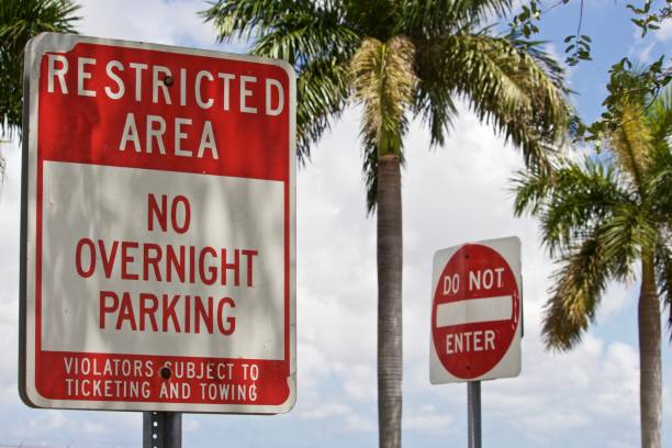 istock Restricted Area No overnight Parking Sign and Do Not Enter sign 1152927459