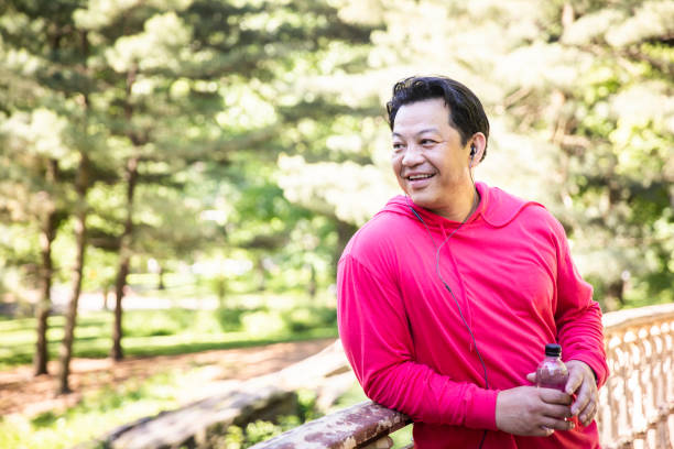 istock Mature Hispanic Man Jogging in Central Park 1152930432