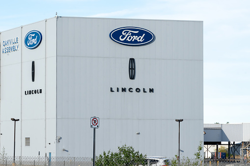 Oakville, Ontario, Canada - May 27, 2019: Sign and building in Ford Motor Company of Canada in Oakville, Ontario, Canada.  The Ford Motor Company is an American multinational automaker.