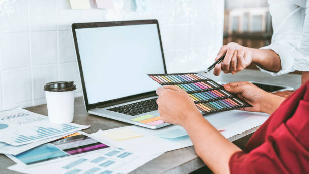 istock Team creative business using laptop planning and thinking of new ideas for success work project in cafe 1152943546