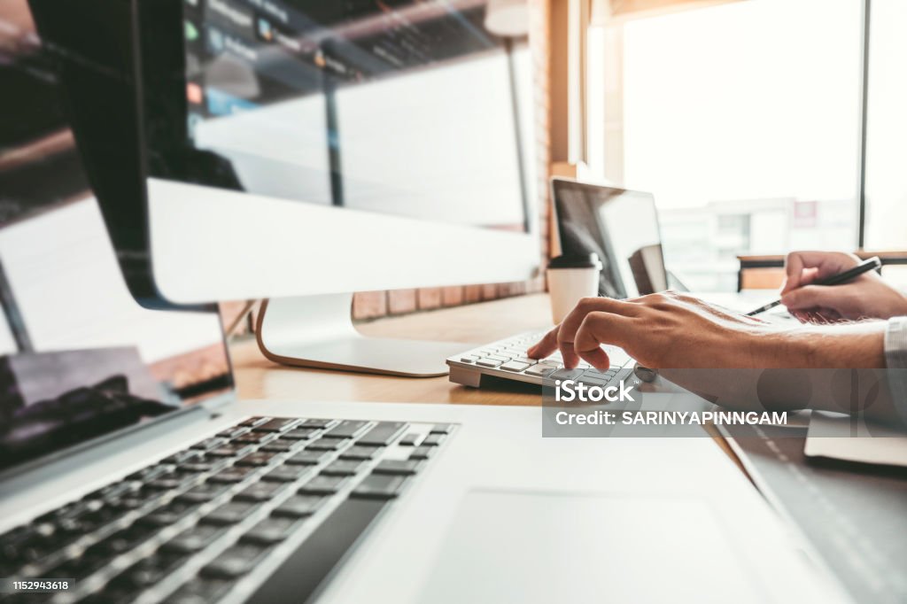 Developing programmer Development Website design and coding technologies working in software company office Office Stock Photo