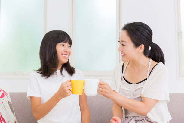 istock asian parent and daughter 1152943936