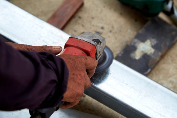 istock Hand Electric wheel grinding on steel structure 1152951316