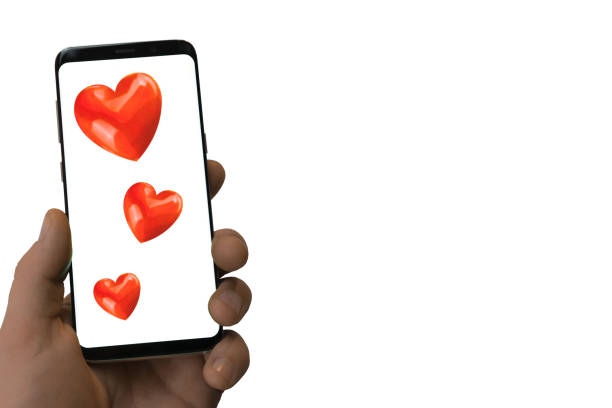 istock male hand holds smartphone with hearts 1152952221