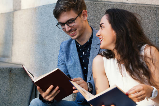 istock Young couple reading books 1152954554