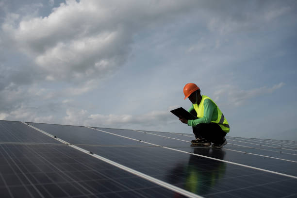 istock Technician engineer checks the maintenance of the solar cell panels. 1152955541