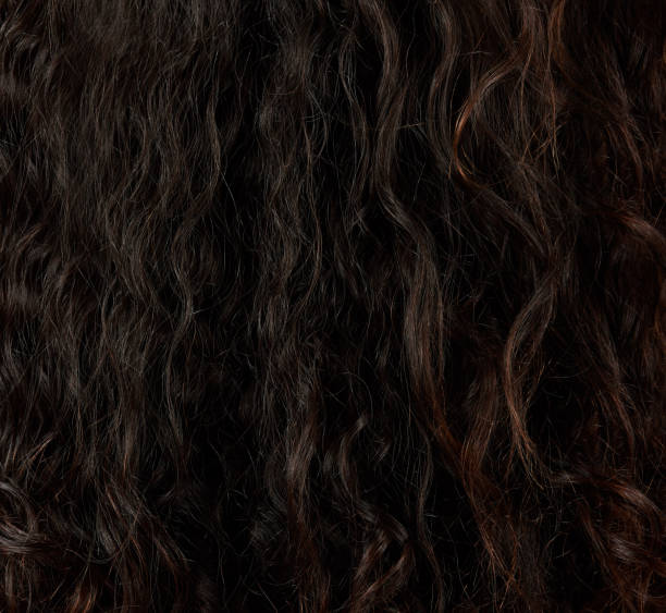 istock Messy curly hair closeup 1152957210