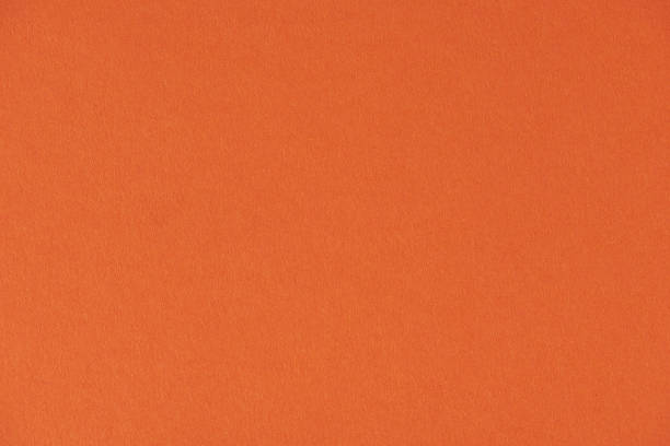 istock Clean orange color paper sheet 1152957213