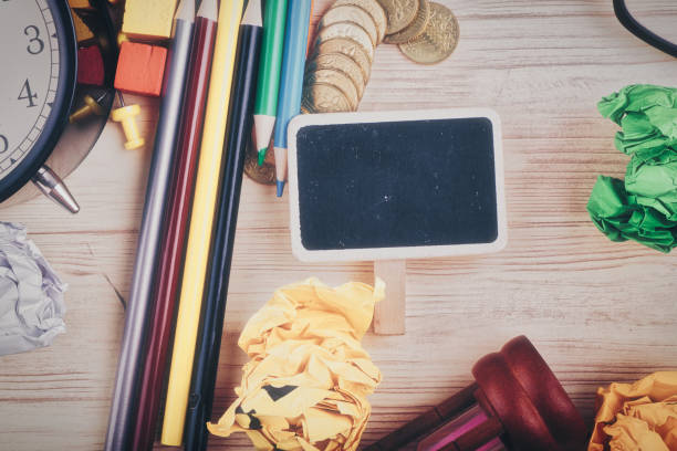 istock flat lay top view shot, scattered home office workspace or desk concept with accessories and stationery 1152957412