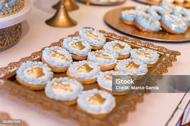 Cookies With Blue And Golden Decoration On Golden Tray Stock Photo - Download Image Now