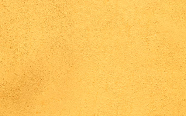 istock golden cement wall texture abstract background 1152962488