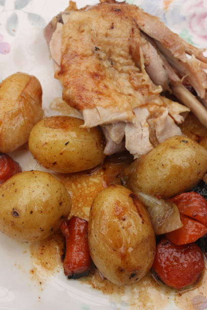 istock Roast chicken with cocotte with potatoes and hash browns 1152965422