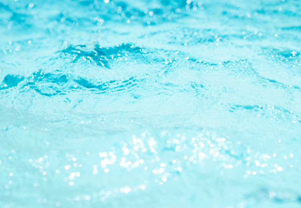 istock Blurred water, glittering bokeh abstract; background nature 1152970635