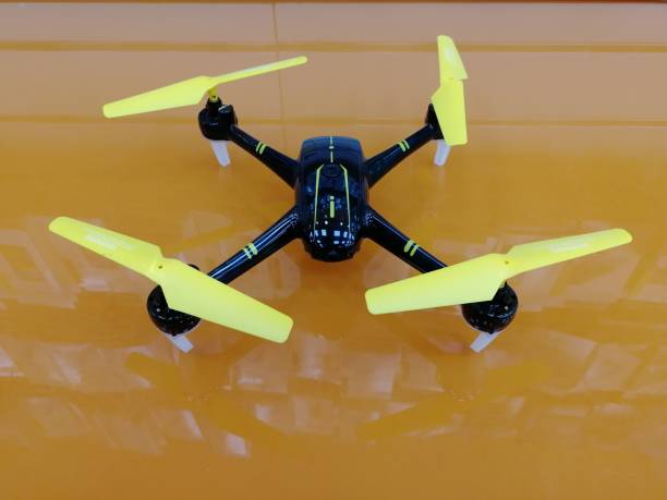 istock Black with yellow stripes and yellow screws quadrocopters with camera 1152972253