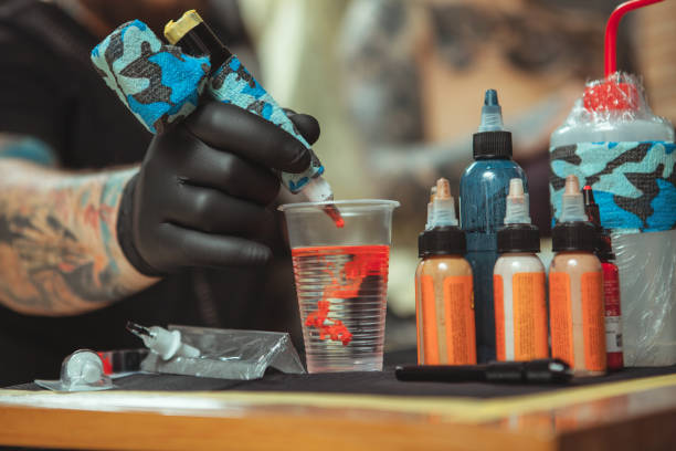 istock Man getting new tattoo by professional tattooist 1152975045
