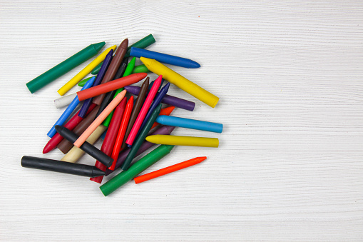 Many colourful crayon, isolated on a white surface, School Supplies