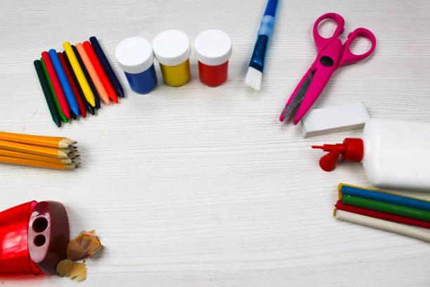 istock School and office supplies on table. Top view with copy space 1152976523