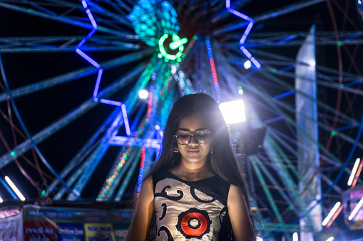 young female model in amusement park