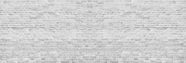 amplia textura de pared de ladrillo lavado blanco. ladrillo vintage gris claro en bruto. fondo panorámico encalado - high resolution fotos fotografías e imágenes de stock