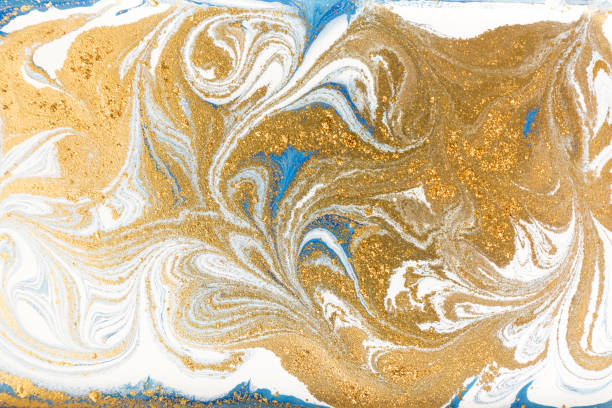 istock White, blue and gold marbling pattern. Golden marble liquid texture. 1152978302