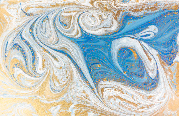 istock White, blue and gold marbling pattern. Golden marble liquid texture. 1152978312