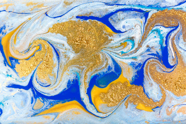 istock White, blue and gold marbling pattern. Golden marble liquid texture. 1152978473