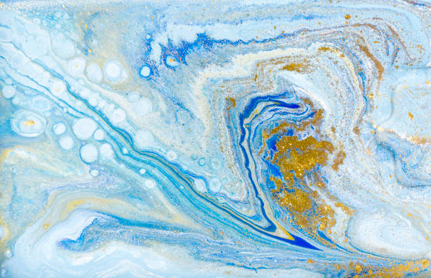 istock White, blue and gold marbling pattern. Golden marble liquid texture. 1152978648