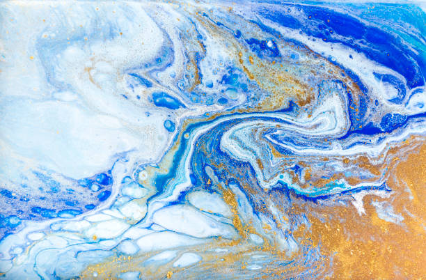 istock White, blue and gold marbling pattern. Golden marble liquid texture. 1152978649