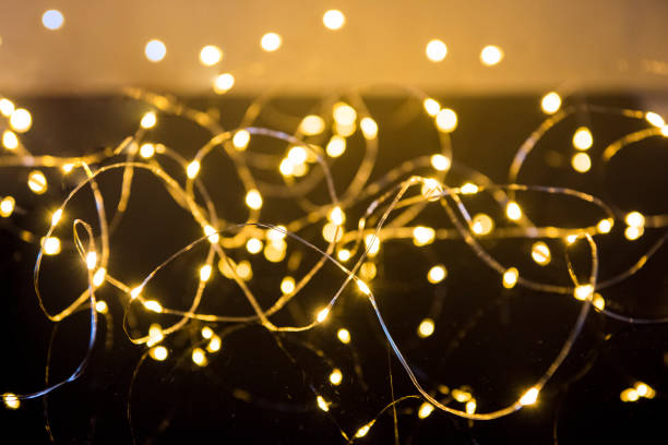 istock Shimmering blur spot lights on abstract background 1152981479