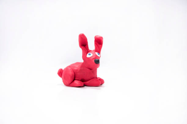 Plasticine artwork. Handmade camel. Abstract isolated photo.