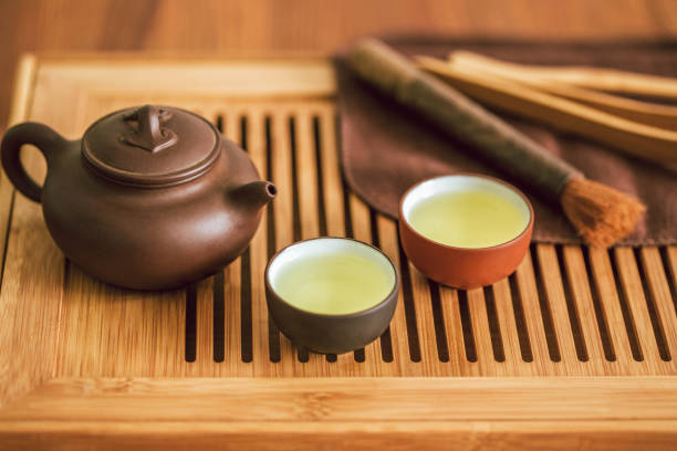 istock Gongfu ceremony with Oolong tea: teapot, two cups and accessories on a chaban 1152982534