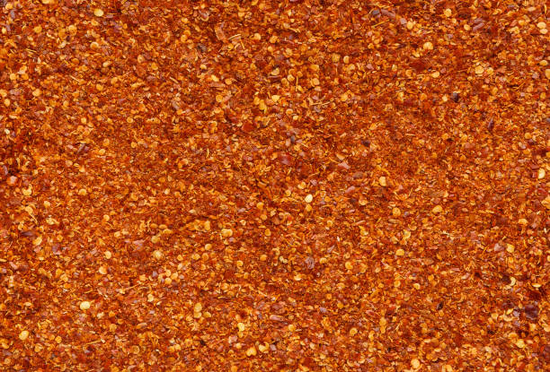 istock Crushed dry red hot chili pepper texture 1152983639