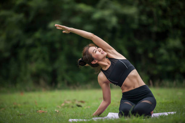istock Yoga action exercise healthy in the park 1152984332