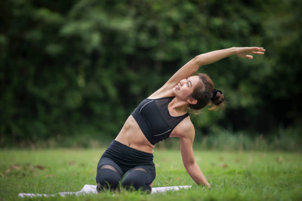 istock Yoga action exercise healthy in the park 1152984362
