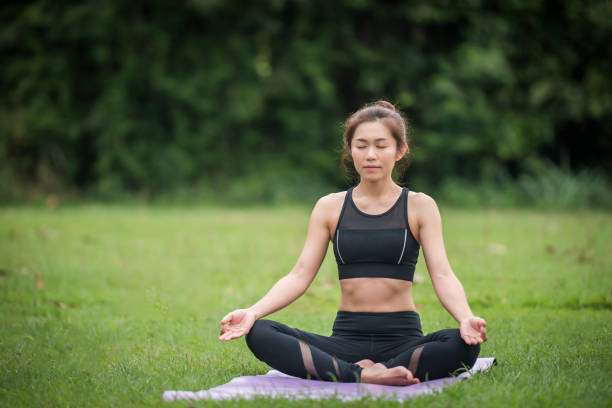 istock Yoga action exercise healthy in the park 1152984365